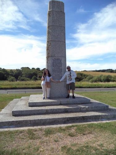 Again Tony and Tatiana in front of the memorial. This time showing the whole memorial, which is a stone obelisk.